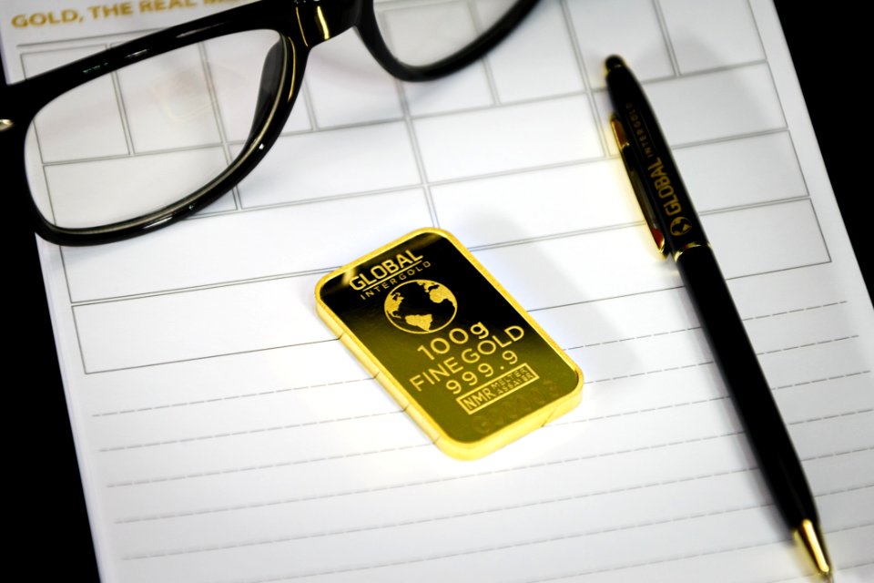 Gold Bar With Pen And Eyeglasses