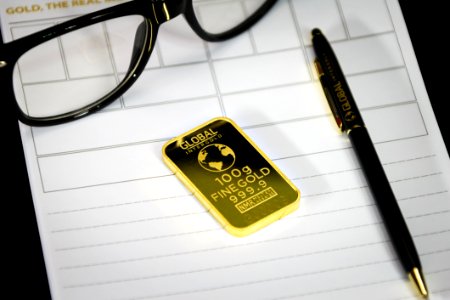 Gold Bar With Pen And Eyeglasses