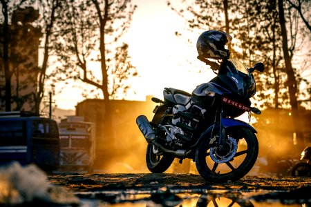 Motorbike Parked With Helmet photo