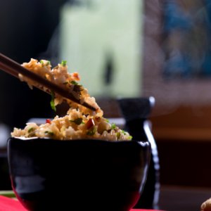 Bowl Of Fried Rice And Chopsticks photo