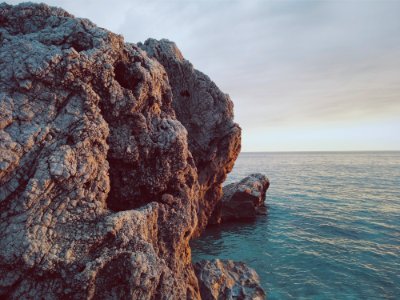 Rock Formation By Ocean photo