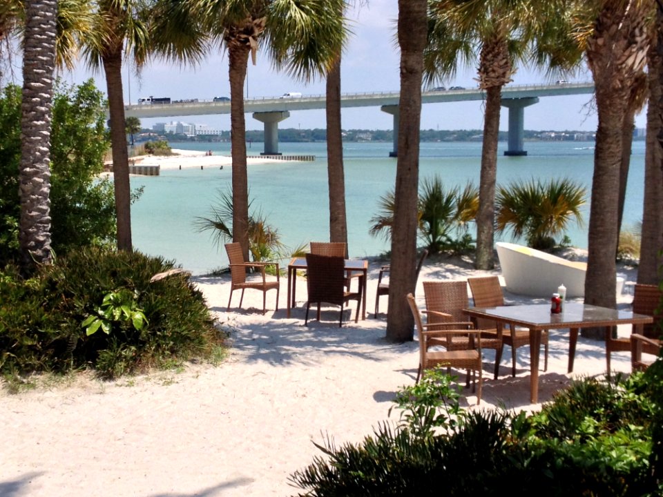 Table And Chairs On Sandy Beach