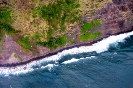 Sky View Of Ocean Against Cliff