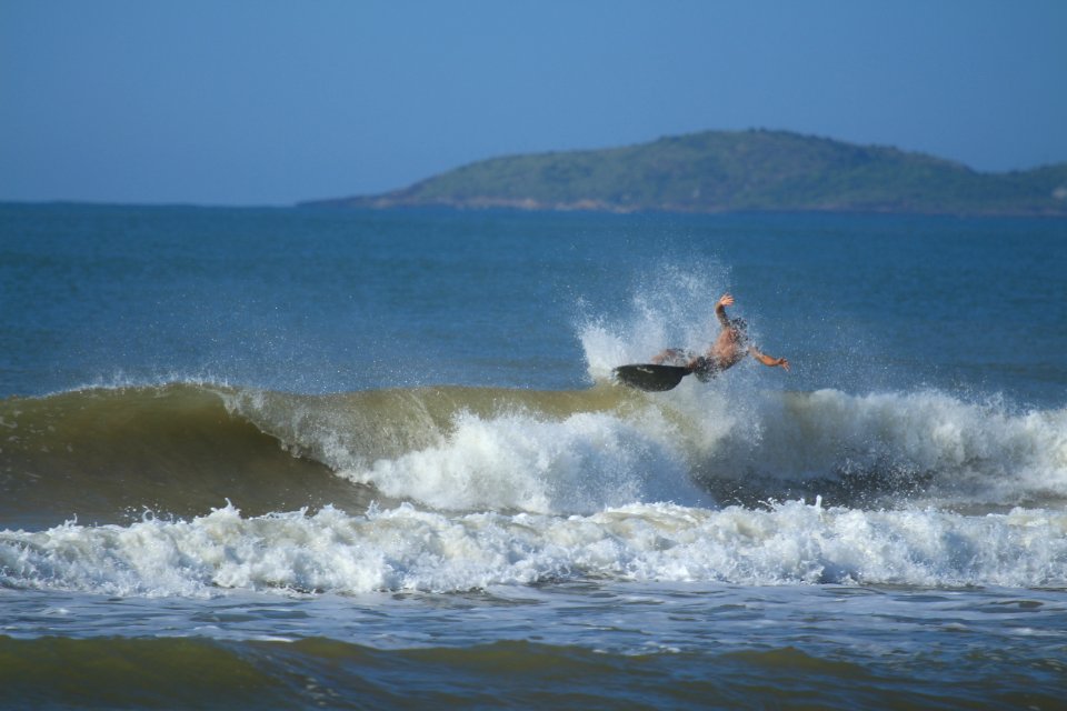 Surfer Surfing On Ocean Waves