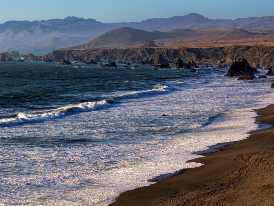 Ocean Waves On A Sandy Beach