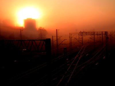 Cars Traveling On Gray Asphalt Road During Sunset photo