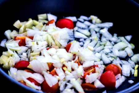 Chopped Onions And Tomatoes In Pan photo