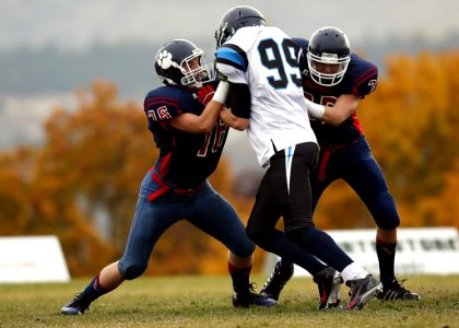 Athletes With Ball On The Background photo