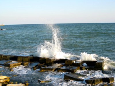 Waves Hitting Ashore photo