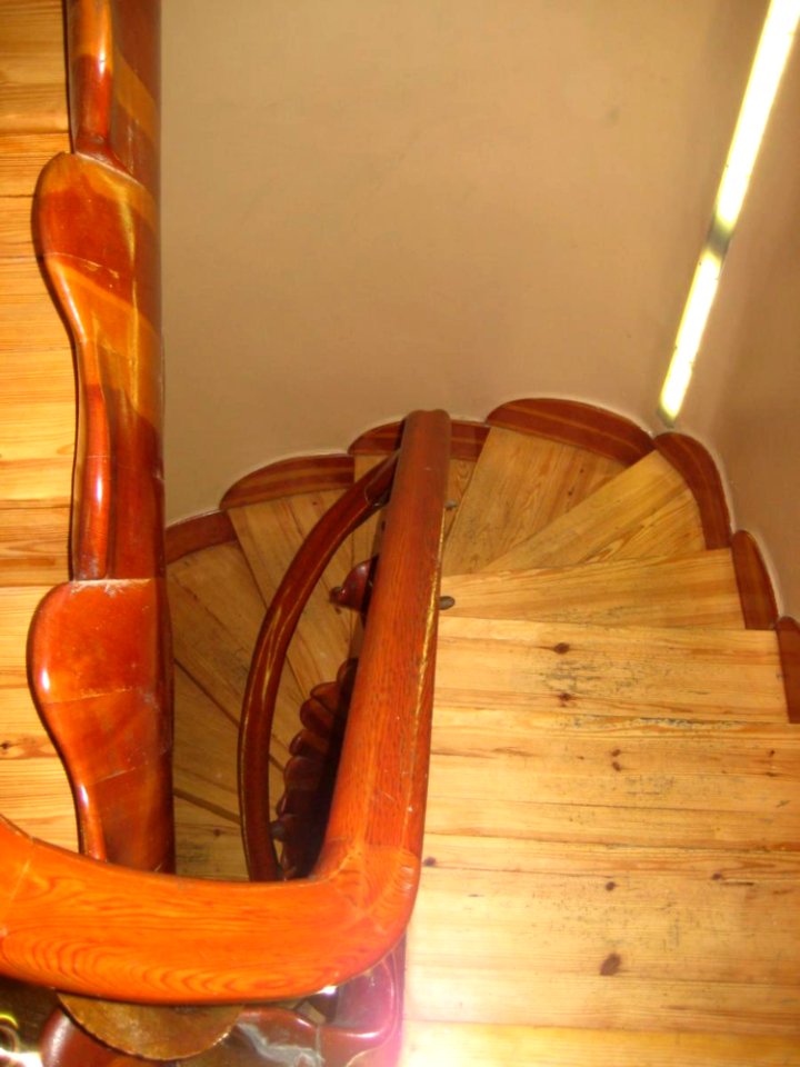 Curved Wooden Staircase In A Home