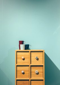 Cabinet With Mugs On Top photo