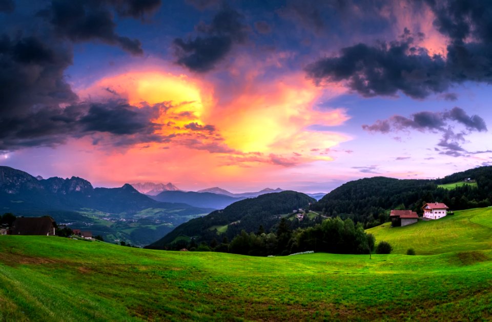 Scenic View Of Landscape Against Cloudy Sky photo