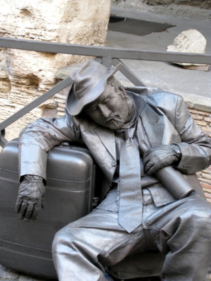 Street Artist In Silver Paint