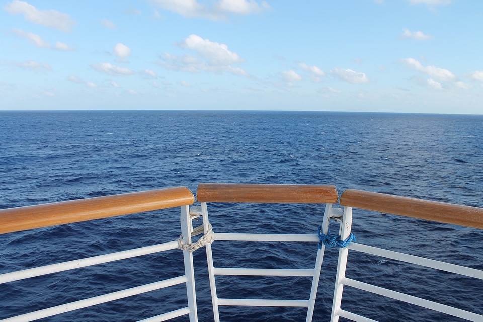 Ocean water railing photo