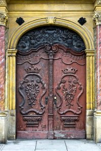 Crown Adorned Doors Of Baroque Building photo