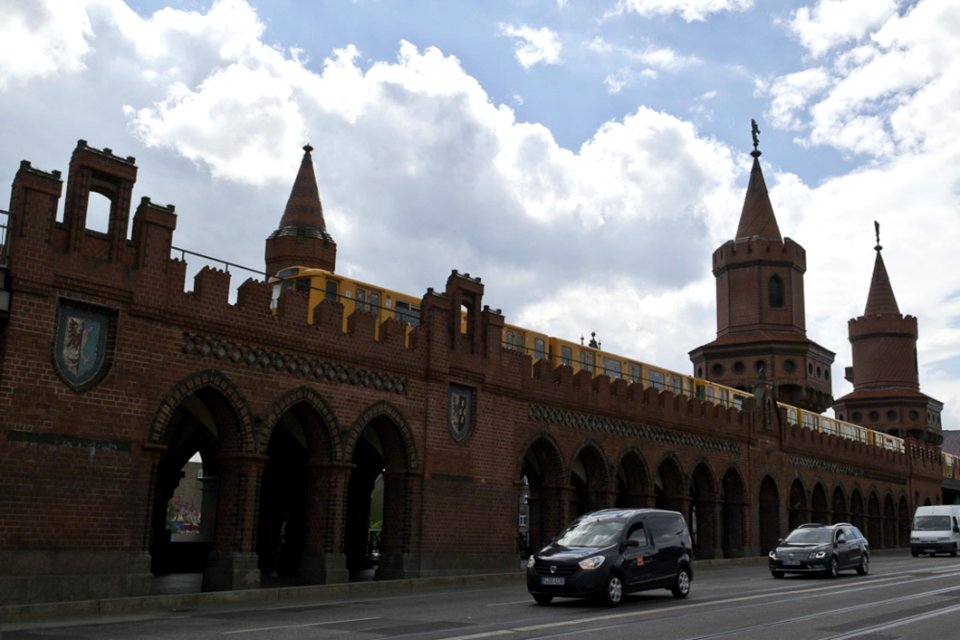 U-Bahn Train And Cars Crossing Oberbaum Bridge