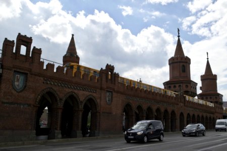 U-Bahn Train And Cars Crossing Oberbaum Bridge