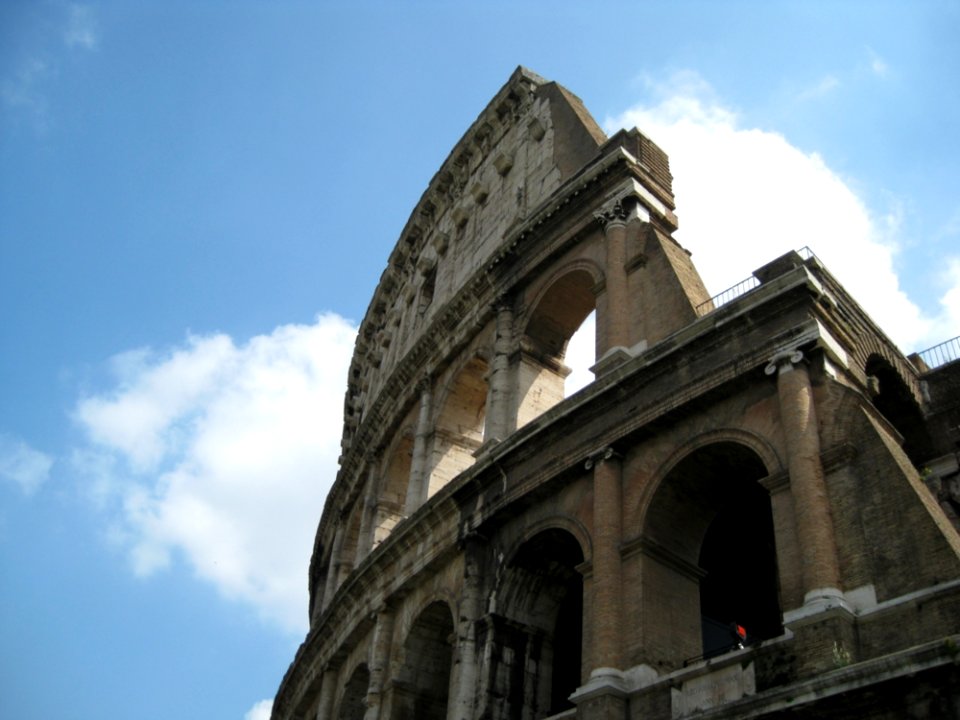 Broken-wall-of-the-colloseum-against-clouds