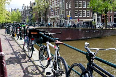 Bicycles Parked On An Amsterdam Bridge photo