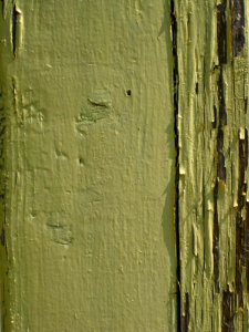 Yellow-paint-peeling-off-wood