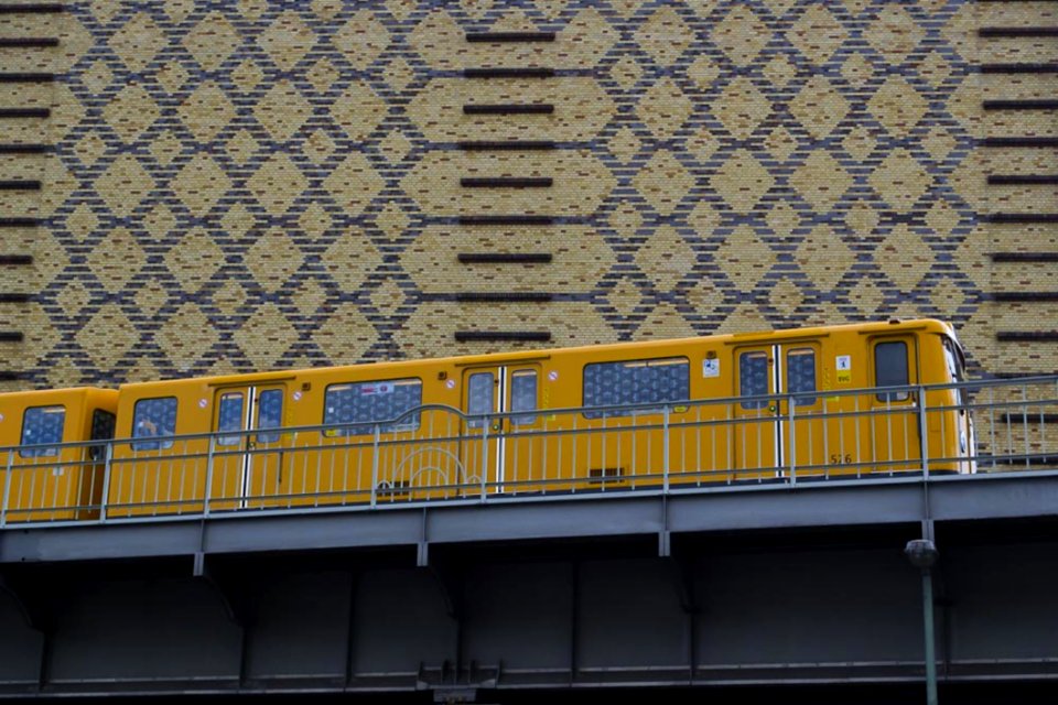 Yellow Train On Elevated Railway
