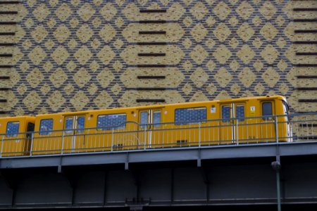 Yellow Train On Elevated Railway