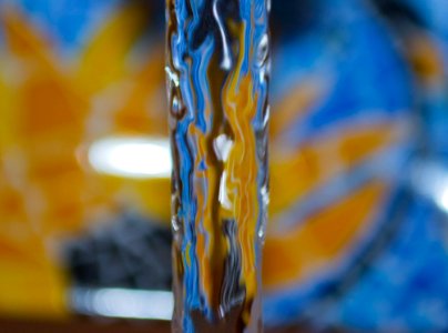 Water-flow-by-blue-and-yellow-tile photo