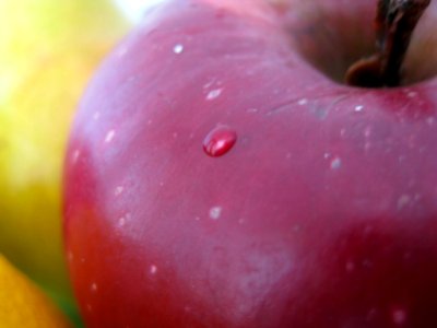 Water-drops-on-red-apple