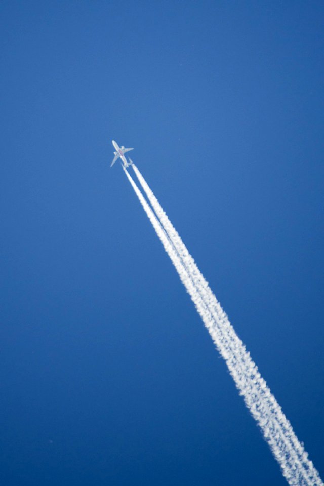 The White Streaks Planes Leave Behind Are Called contrails Or condensation Trails The Cold Air Causes The Water Vapo photo