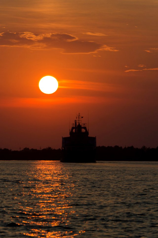 Ship Sailing Into Sunset