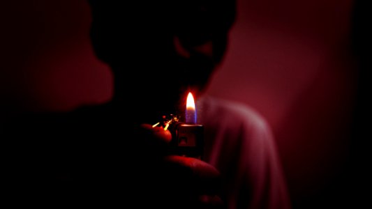 Boy Carrying Lighted Candle