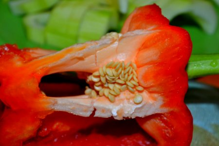 Seeds-on-sliced-red-bell-pepper photo