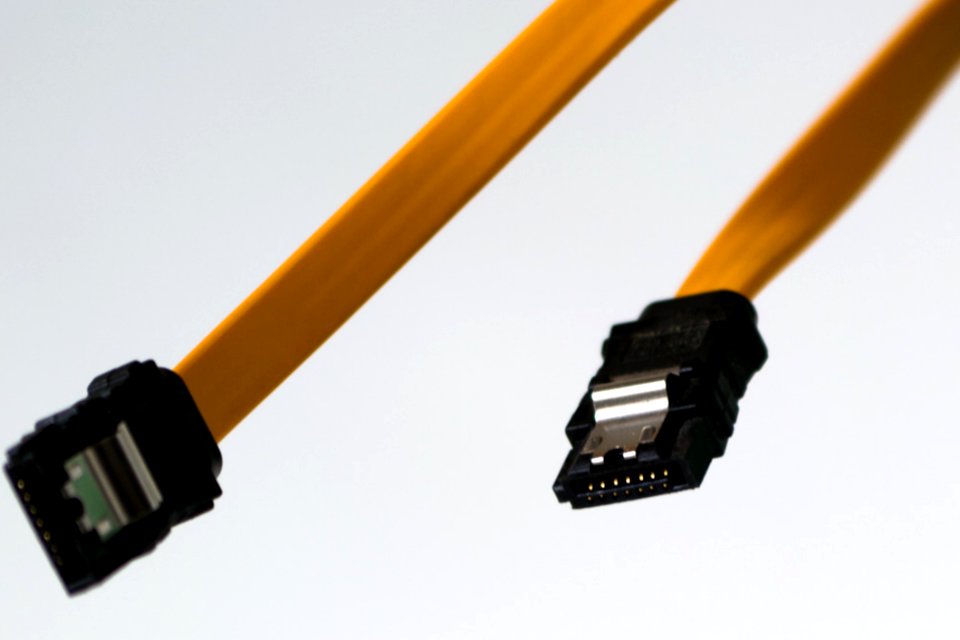 Yellow SATA Cables Used To Transfer Data To Mass Storage Devices Like Optical Drives And Hard Drives