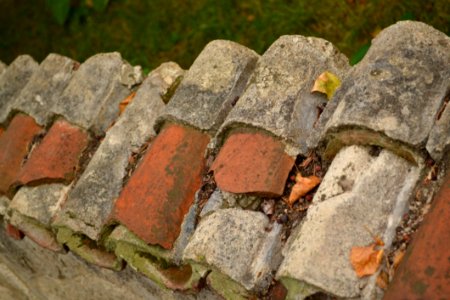 Row-of-broken-roof-tiles