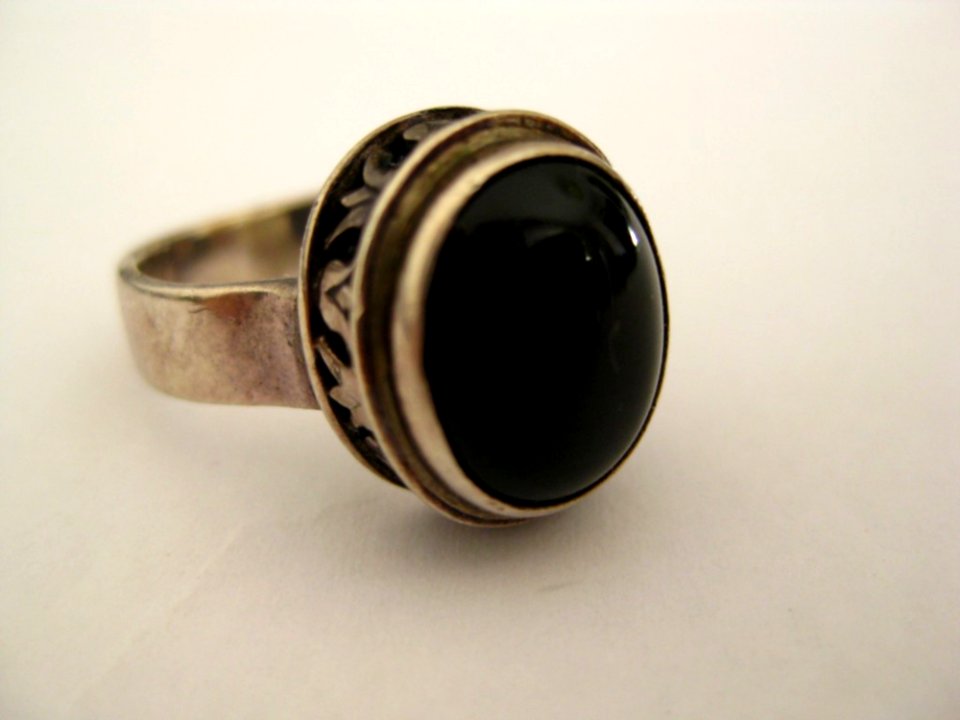 Silver-ring-with-large-black-stone