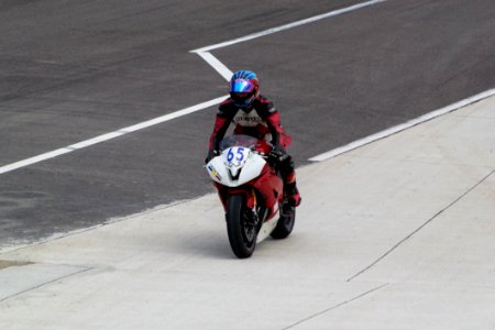 Motorcycle Driver Pulling To The Paddocks