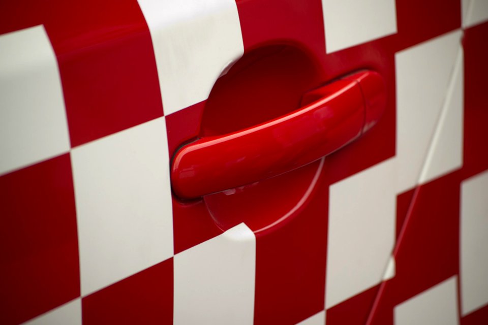 Picture Of Red And White Squares Livery On Racing Car