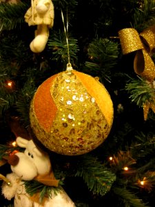 Golden-sequins-christmas-tree-ornaments-and-toys photo