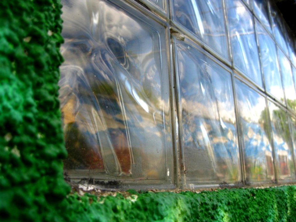 Glass-wall-reflecting-grafitti