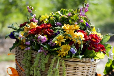 Beautiful Summer Floral Arrangement In A Wicker Basket photo