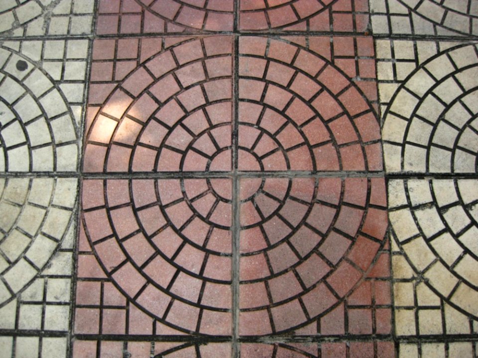Concentric-reddish-and-grey-pavement