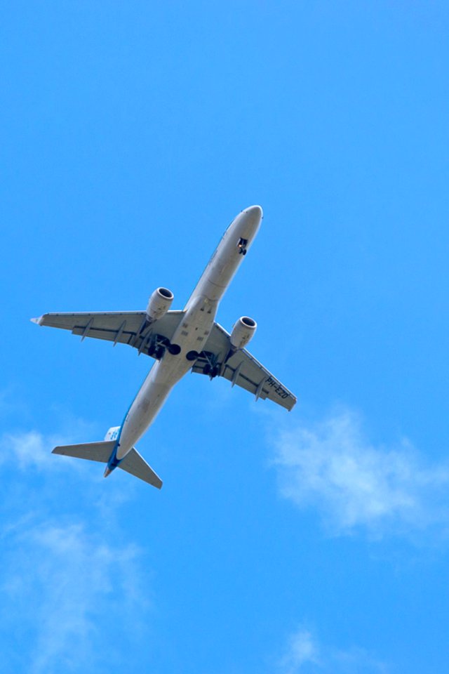 Embraer Aircraft Approaching Airport
