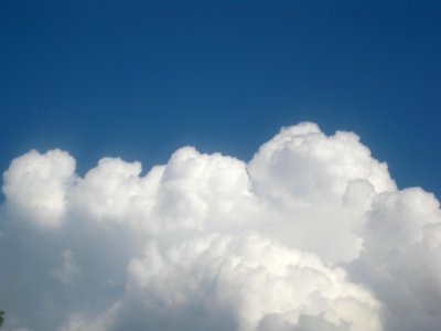 Cumulus-clouds-against-blue-sky