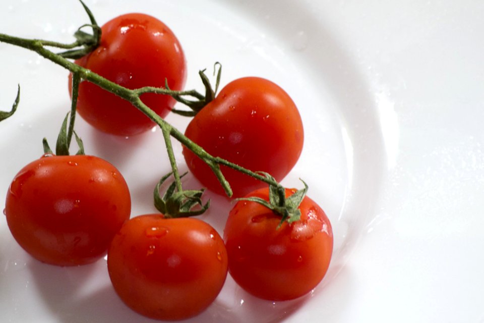 Photo Of Cherry Tomatoes On Display This Vegetable Is Actually A Fruit Of The Berry Family Used In Salads Appetizer Or Garnish
