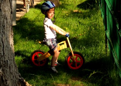 Boy-on-wooden-bicycle