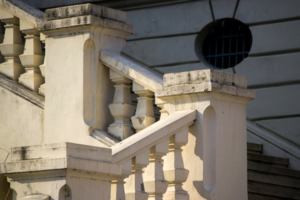 Warm Sunset Light On Stone Staircase Of A Palace