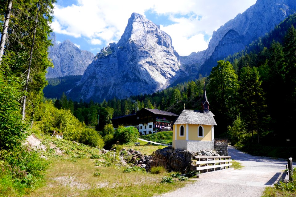 View Of Village With Mountain Range In Background