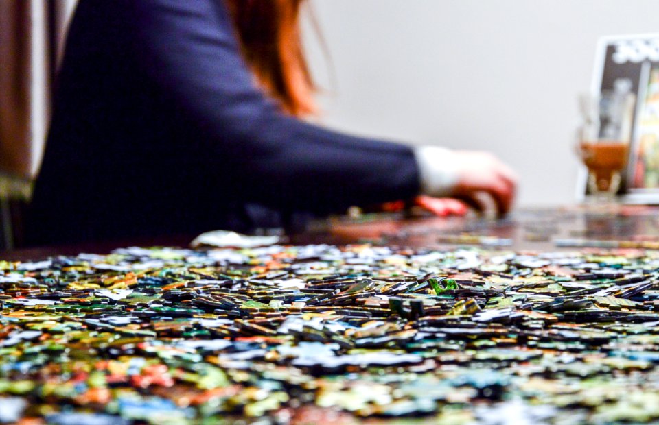 Woman Doing Jigsaw Puzzle