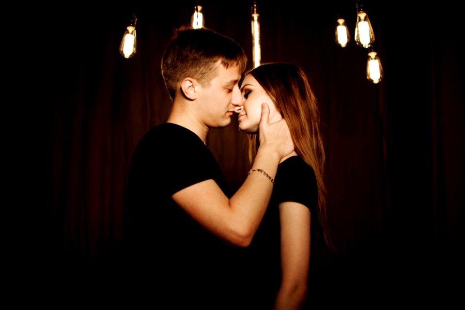 Young Couple Kissing At Night