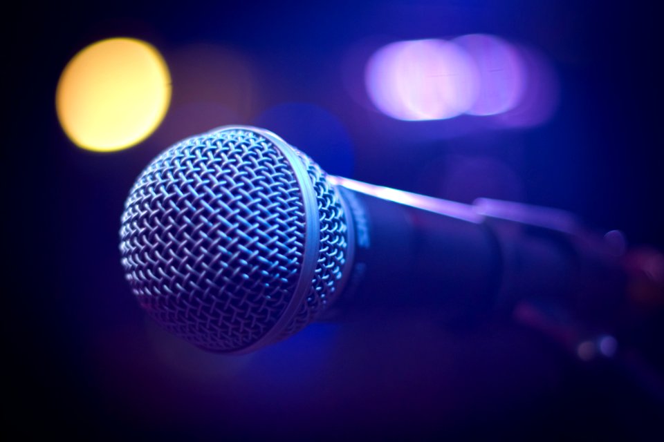 Tilt Shift Photograph Of Gray And Black Microphone